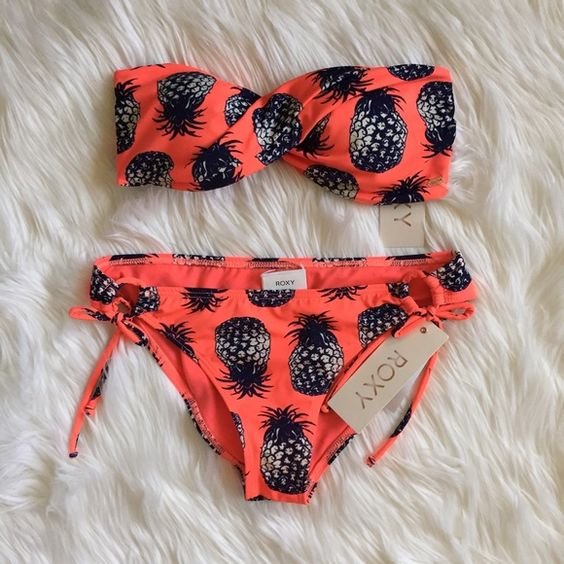 Pineapple bathing suit Bright coral bathing suit with pineapples. Size medium both top and bottom. Brand new with tags. twist bandeau came with no straps.. $45 thru Ⓜ️ercari ❌ PLEASE DO NOT ASK FOR MY LOWEST, MAKE AN OFFER INSTEAD (button below) ❌ SERIOUS BUYERS ONLY ❌ NO TRADES Roxy Jackets & Coats: 