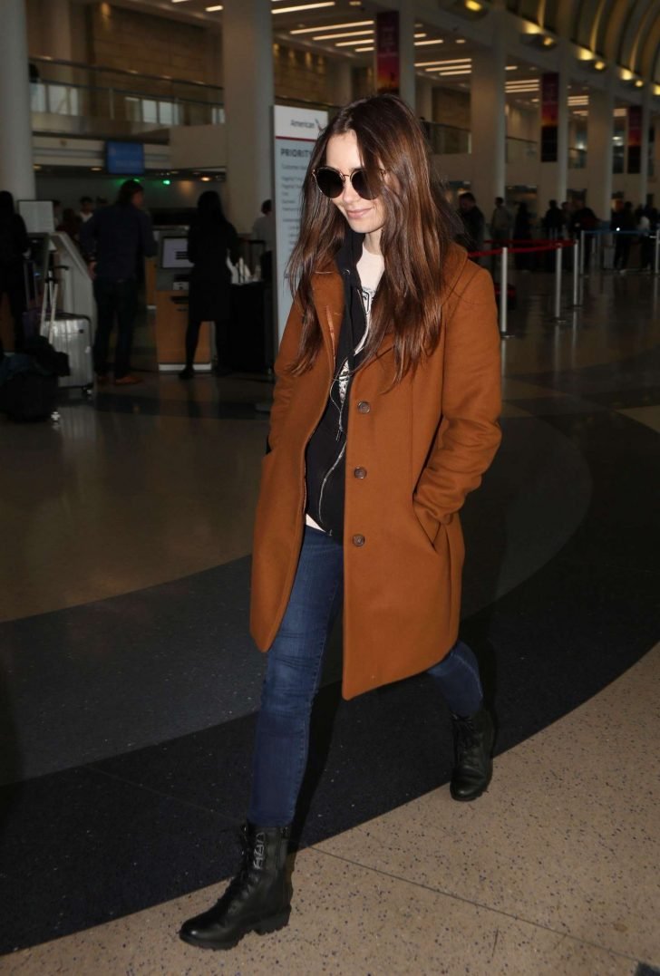 Lily Collins at LAX Airport in Los Angeles -06