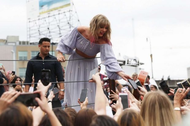 Taylor Swift at the new Kelsey Montague What Lifts You Up Mural -02