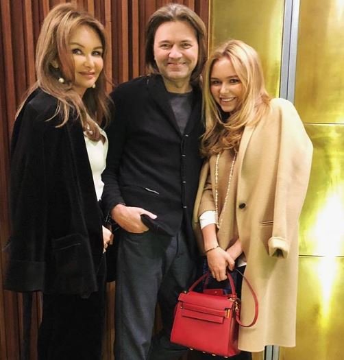 Дмитрий и Елена Маликовы с дочерью Стефанией