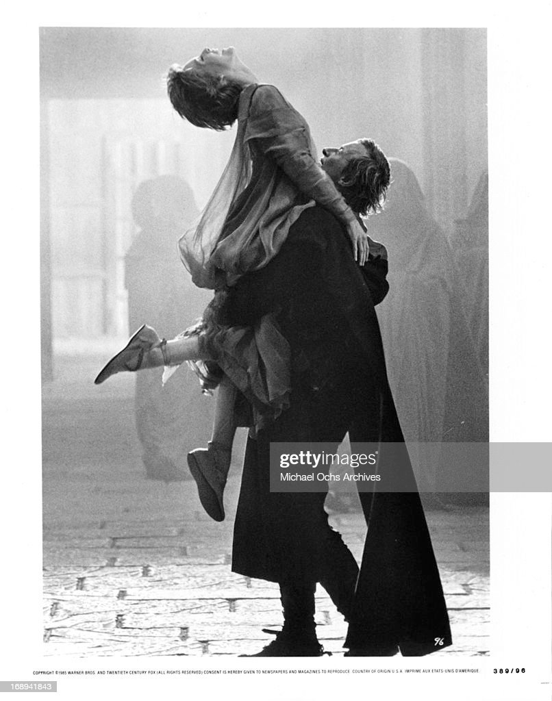 https://media.gettyimages.com/photos/michelle-pfeiffer-is-lifted-by-rutger-hauer-in-a-scene-from-the-film-picture-id168941843