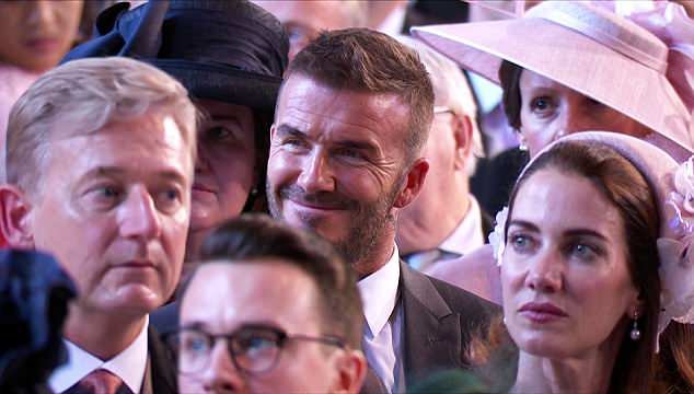 David Beckham seemed to enjoy the impassioned, reverend's address, as he sat smiling in the crowdÂ 