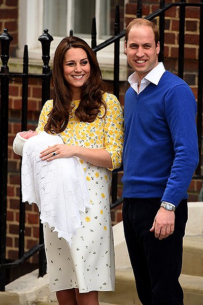 Герцогиня Кэтрин и принц Уилльям с новорожденной