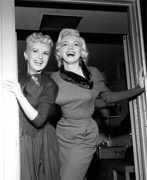 Betty Grable and Marilyn Monroe on the set of How TO MARRY A MILLONAIRE