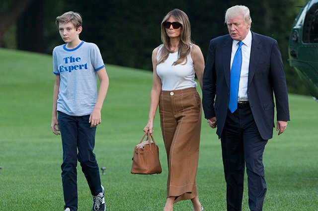 Дональд и Мелания Трамп с сыном Бэрроном