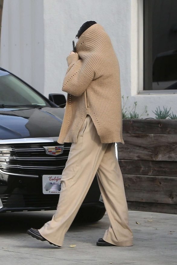 Selena Gomez - Seen while covers her face leaving the dance studio in Burbank