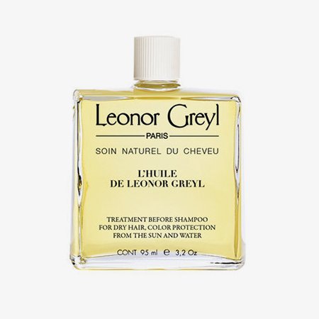 Масло для волос Leonor Greyl L'Huile De Leonor Greyl. Оно восстанавливает и смягчает локоны, кроме того, защищает их от агрессивного воздействия солнца и морской воды