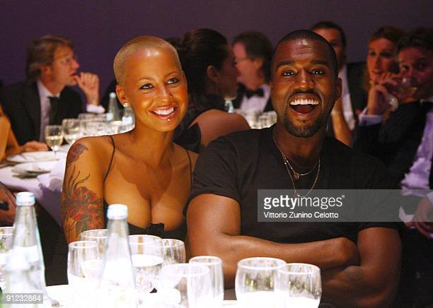 https://media.gettyimages.com/photos/amber-rose-and-kanye-west-attend-amfar-milano-2009-dinner-the-milan-picture-id91232864?s=612x612