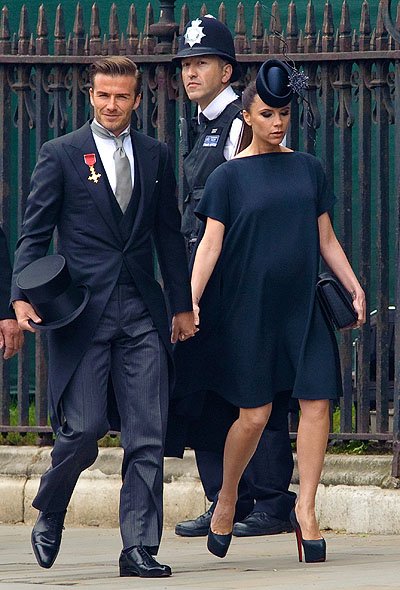 Дэвид и Виктория Бекхэм (беременная Харпер) на свадьбе принца Уилльяма и герцогини Кэтрин