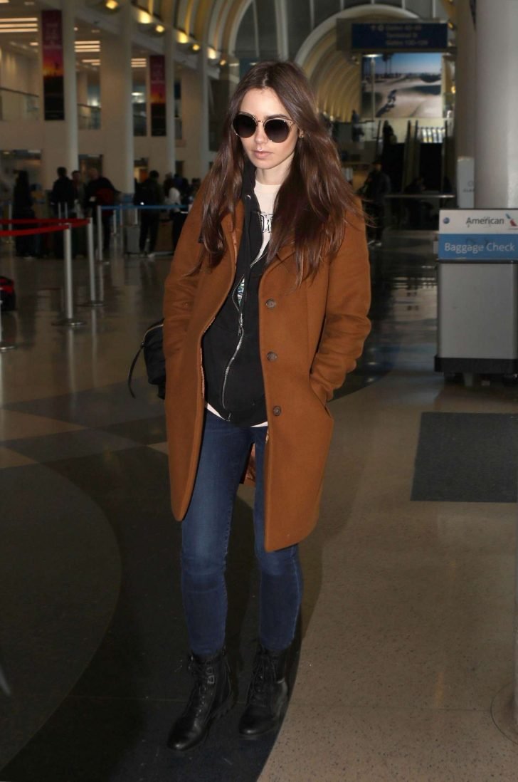 Lily Collins at LAX Airport in Los Angeles -03