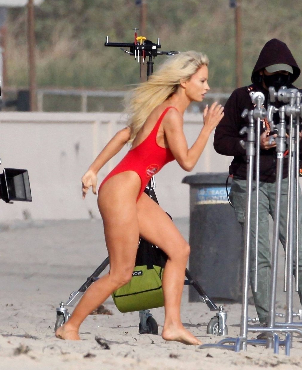 Lily James 2021 : Lily James – As Pamela Anderson in red swimsuit films Pam and Tommy in Malibu-03