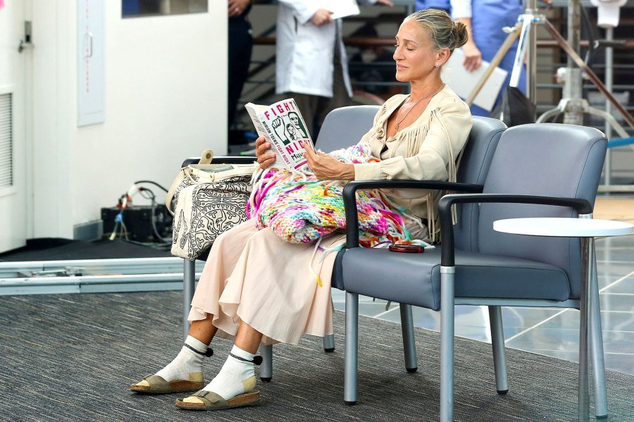 https://www.usmagazine.com/wp-content/uploads/2021/08/SJP-Sarah-Jessica-Parker-Somehow-Makes-Socks-and-Sandals-Look-Chic-While-Filming-SATC-Reboot.jpg?w=900&quality=86&strip=all