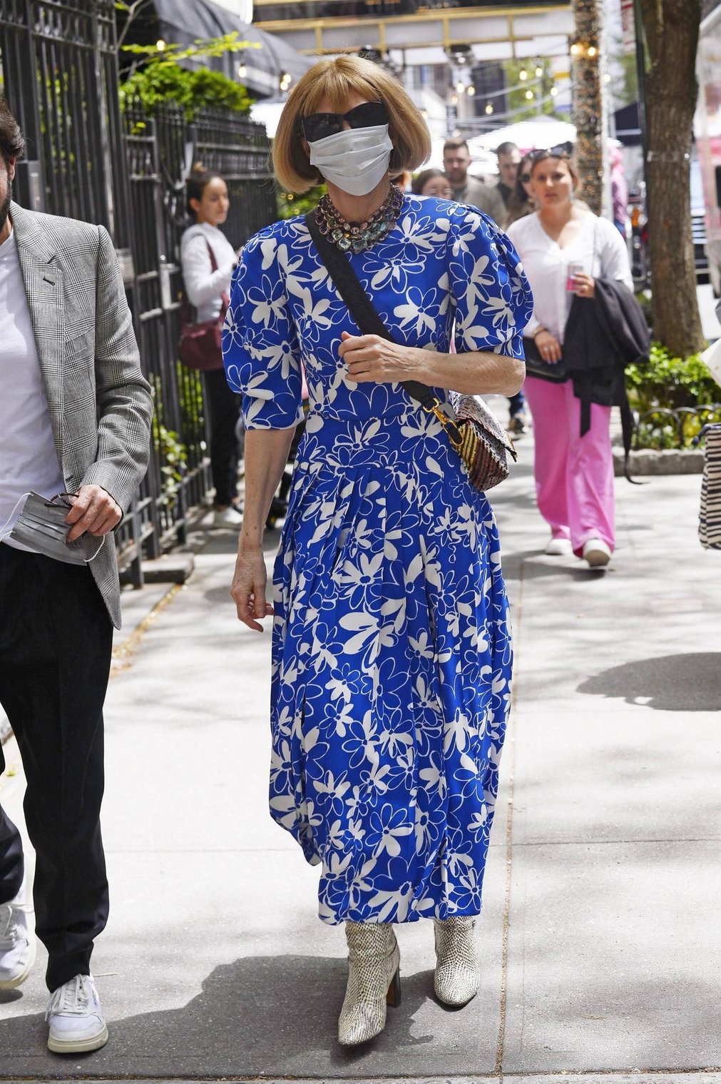Anna Wintour - In a summer blue dress exits the Mark Hotel in New York