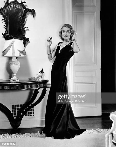 https://media.gettyimages.com/photos/actress-constance-bennett-modeling-an-evening-gown-picture-id526851882?s=612x612