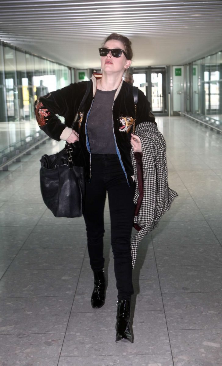Amber Heard at Heathrow Airport in London -01