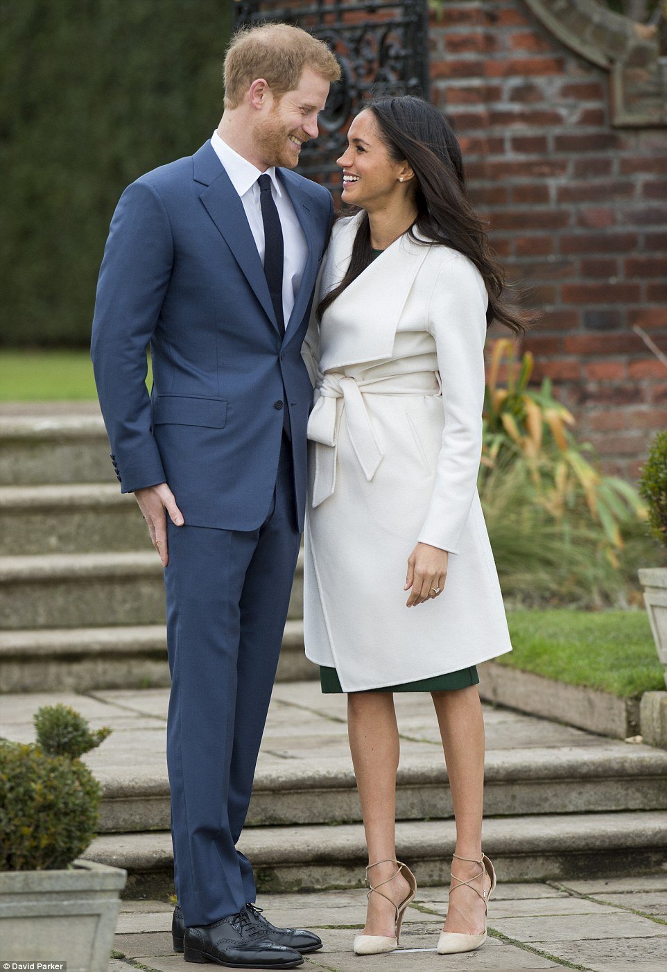 Websites crashed as fashionistas around the globe scrambled to emulate Ms Markle's look today. Her white coat was by Canadian brand Line the Label while show wore Aquazzura Matilde Crisscross Nude Suede Pumps