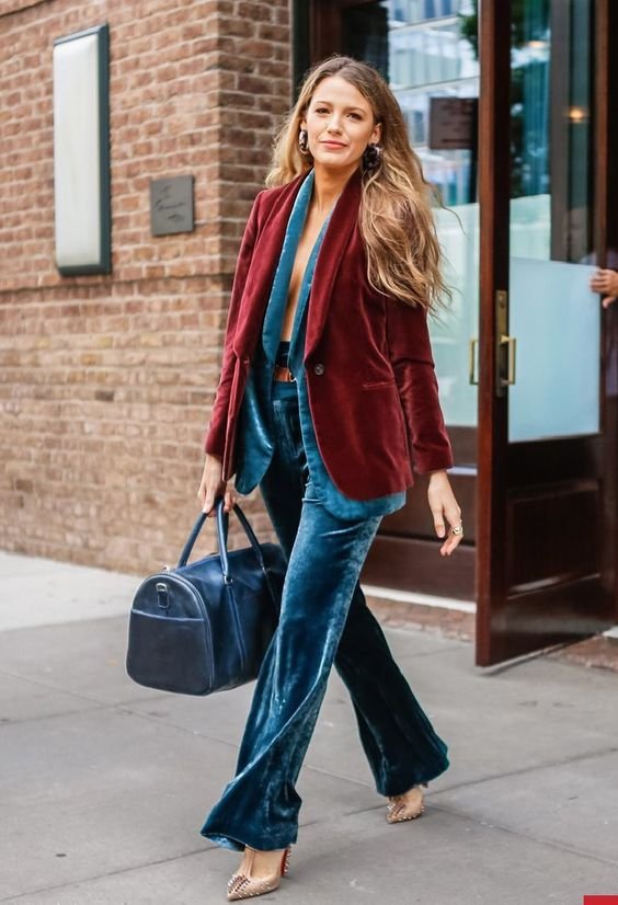 Elle, C. 2018. Blake Lively wearing the pant suit inspired by men's fashion. This pant suit is modified with a colorful palette and velvet fabrication.