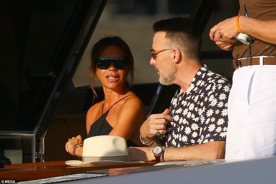 Close: the former advertising executive and the sun-kissed star engaged in a lively conversation as they kicked their feet up on the boat