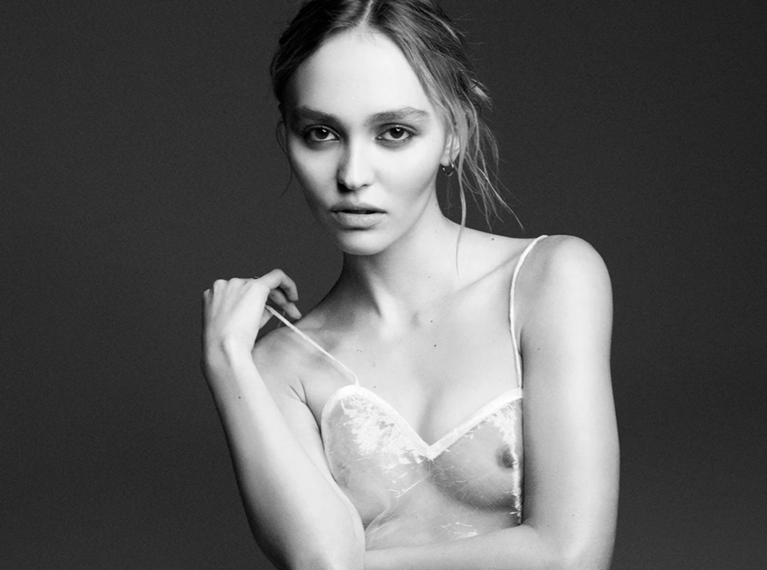 Lily-rose depp poses topless