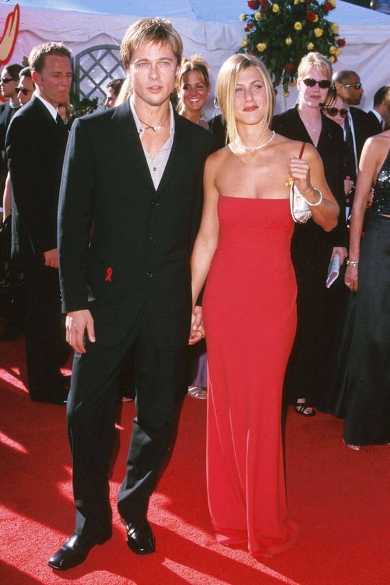 In Prada with her then husband Brad Pitt at the 52nd Annual Emmy Awards. - ELLE.com
