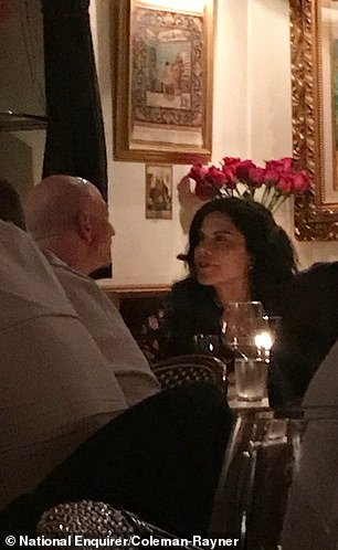 The photos, which were taken on October 30, show Bezos and Sanchez staring intently to each other's eyes and laughing together during the dinner