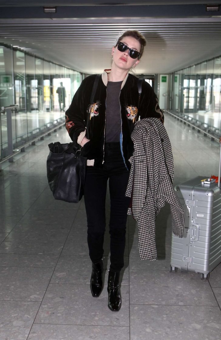 Amber Heard at Heathrow Airport in London -02