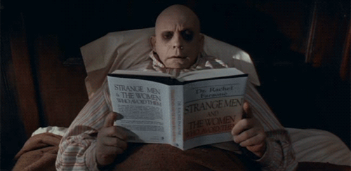 https://s2982.pcdn.co/wp-content/uploads/2017/02/The-Addams-Family-reading.gif