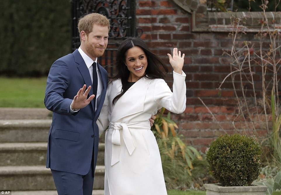 The prince said he was 'thrilled, over the moon' adding: 'Very glad it's not raining as well.' Meghan said she was 'so happy' before they wandered back into Kensington Palace beaming