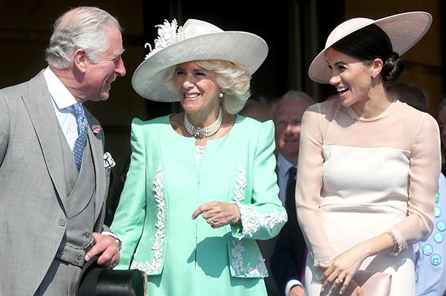 Принц Чарльз с супругой Камиллой и Меган Маркл