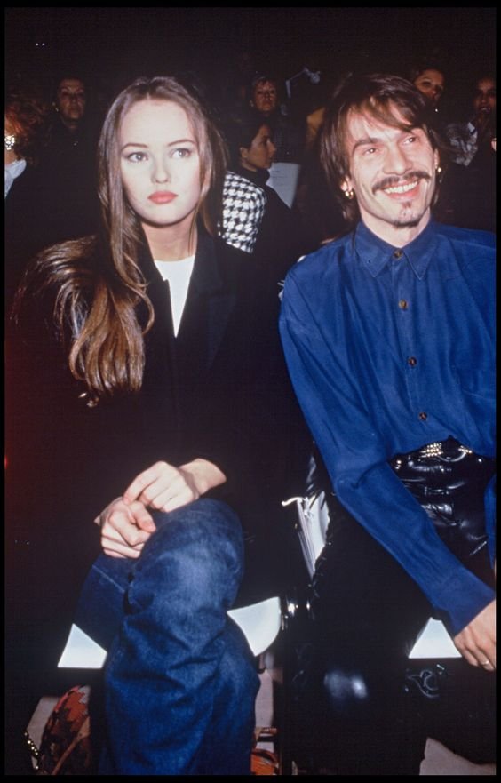Vanessa Paradis sits beside her then-beau Florent Pagny at a 1992 Chanel show.