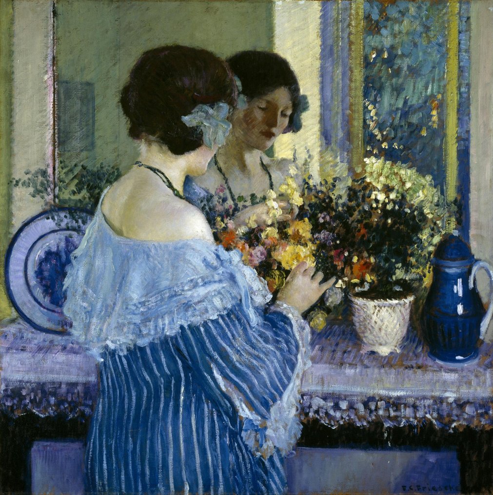 Girl in Blue Arranging Flowers By Frederick Carl Frieseke - Famous Art