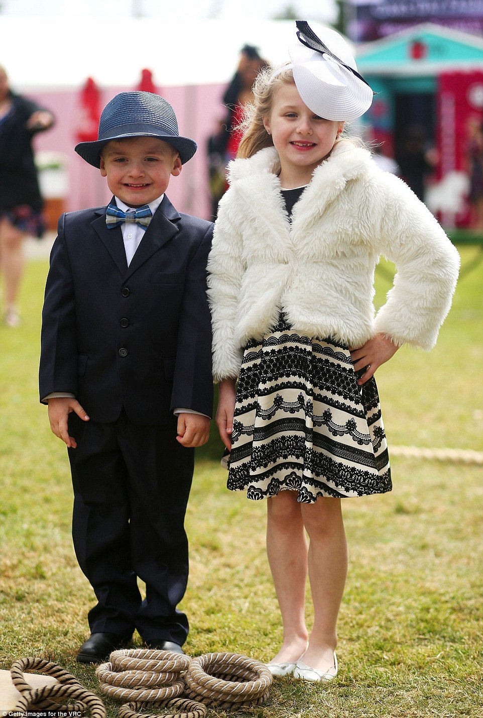 Bucking the trend and opting for black and white outfits, these two young fashionistas kept it classy as they got involved in one of the activities on offer