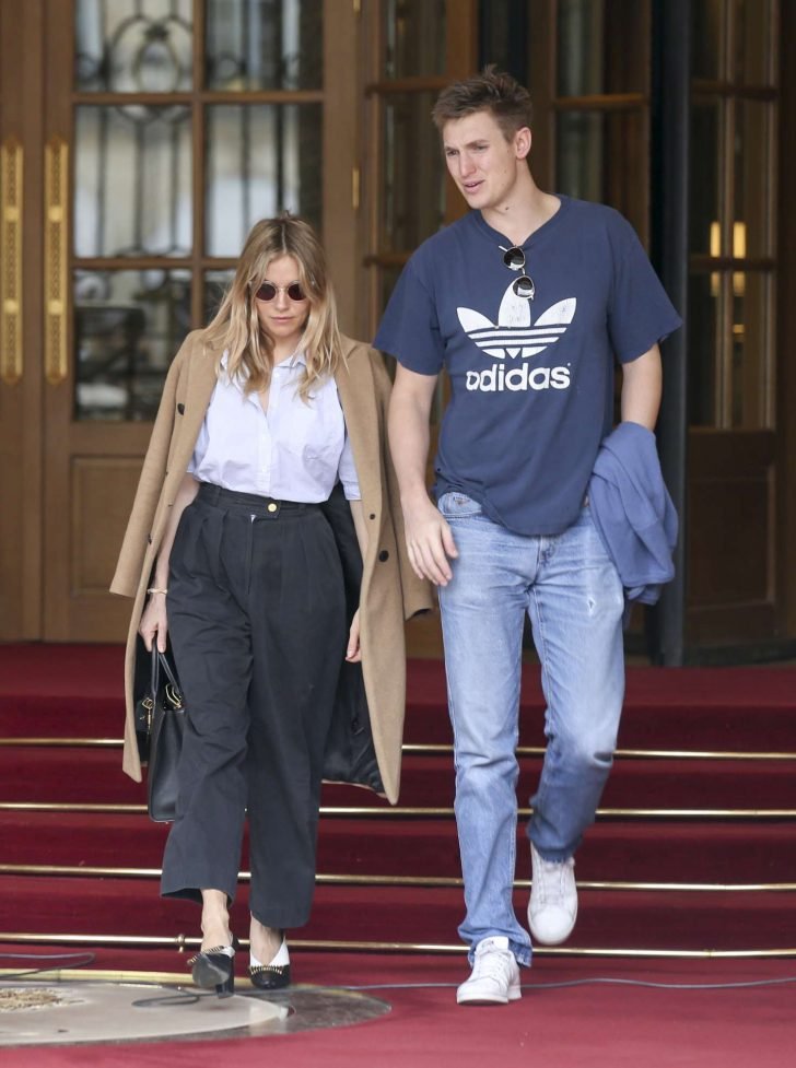 Sienna Miller and boyfriend Lucas Zwirner - Leave their hotel in Paris