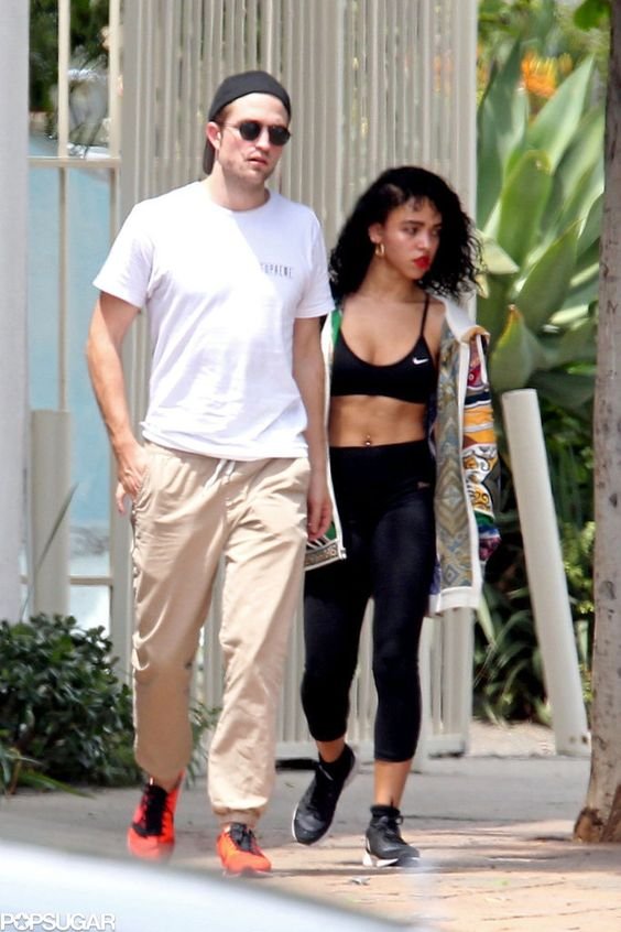 Robert Pattinson Is All Smiles With His Ab-Baring FiancÃ©e Ahead of His Birthday: Robert Pattinson had his arms around his fiancÃ©e, FKA Twigs, when the couple stepped out in LA on Monday.