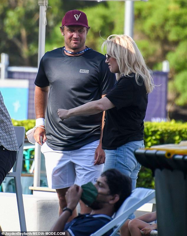 Game, set and love match! Rebel Wilson did little to quell romance rumours with tennis player Matt Reid on Monday when the pair were spotted having a cosy chat on day two of the Sydney Tennis Classic