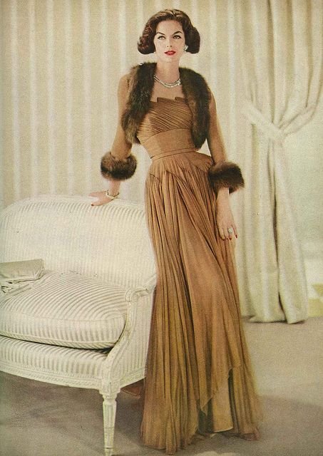 September Vogue 1956    Anne is wearing a gown made of silk marquisette which was available from Sophie's custom order collection at Saks Fith Avenue. Photographed by Frances McLaughlin-Gill.