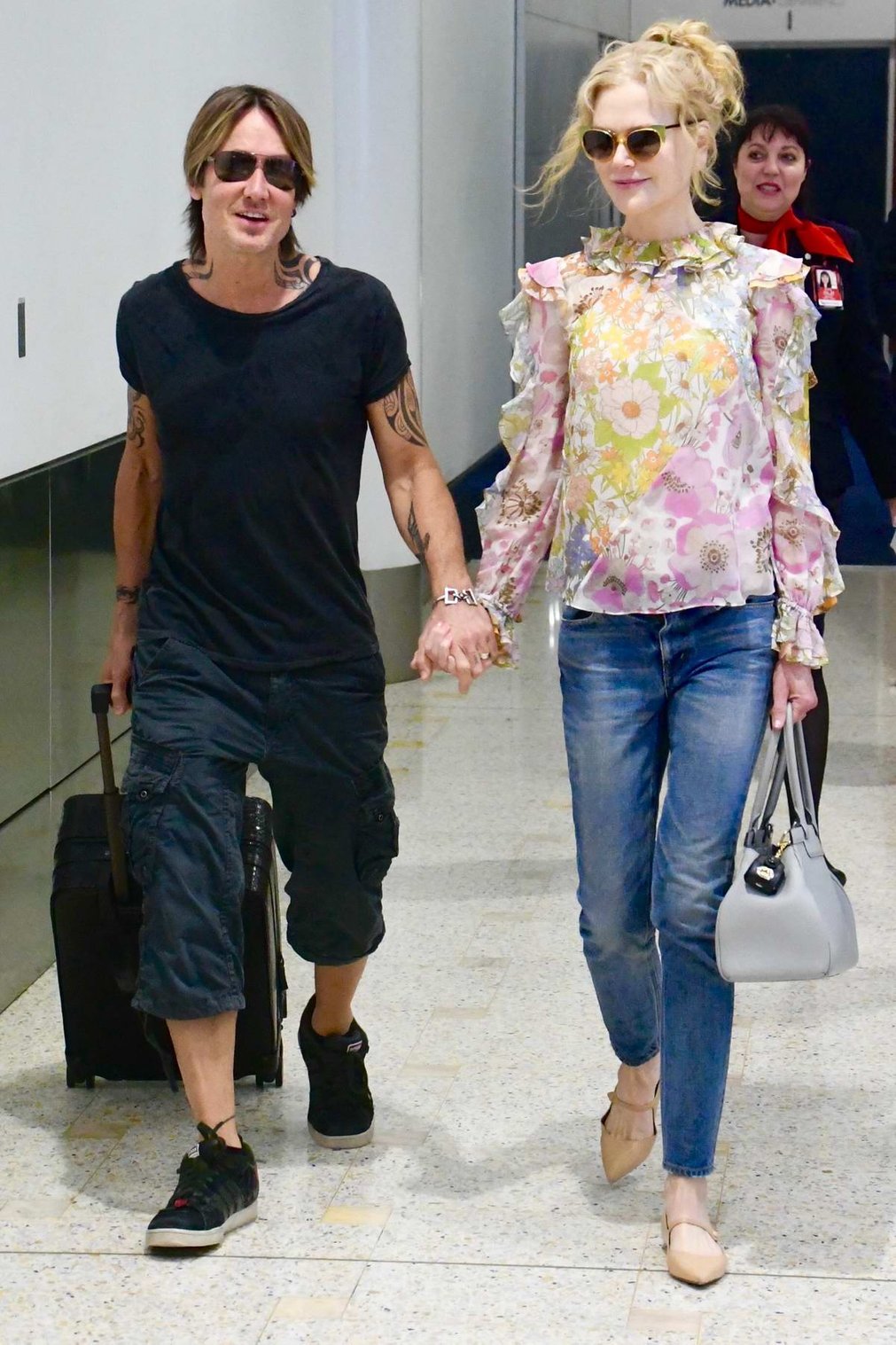 Nicole Kidman is all smiles as Keith Urban picks her up at the airport in  Sydney,