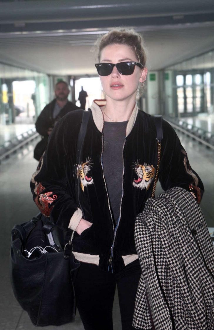 Amber Heard at Heathrow Airport in London